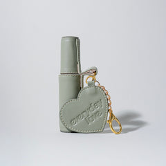 Bag charm mini Óleo capilar